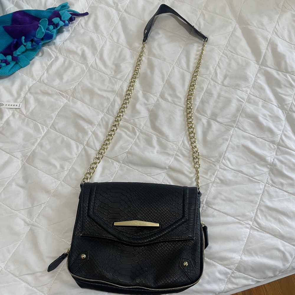 Danielle Nicole black purse with gold chain strap